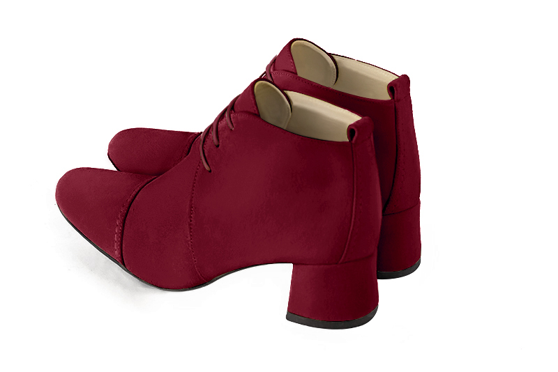 Burgundy red women's ankle boots with laces at the front. Round toe. Low flare heels. Rear view - Florence KOOIJMAN